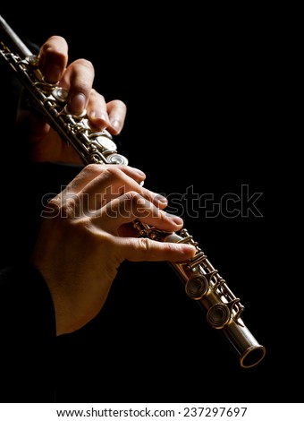 Flute in hands - music background