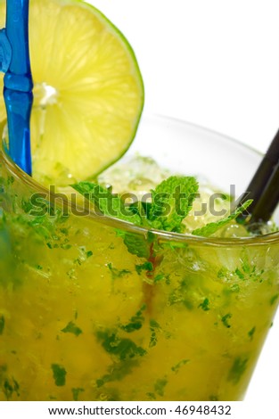 Mojito mixed drink with mint garnish on a white background