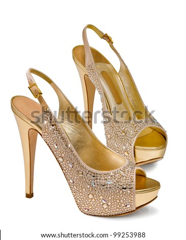 gold women's shoes isolated on white background