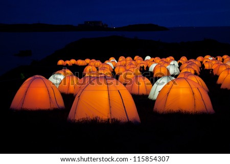 Cemaes Bay Peace Camp an artwork of lighted tents and poetry bring read throughout the night Isle of Anglesey