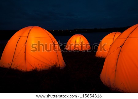 Cemaes Bay Peace Camp an artwork of lighted tents and poetry bring read throughout the night Isle of Anglesey