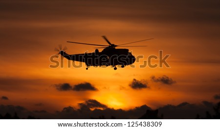 Seaking helicopter in the sunset from RAF Valley Search and Rescue flight