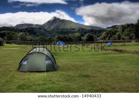 Snowdonia mountain range with cloud hanging suspended on the hill tops