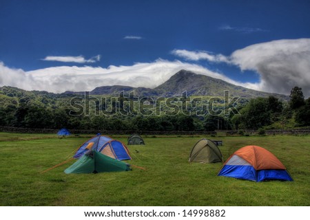 Snowdonia mountain range with cloud hanging suspended on the hill tops