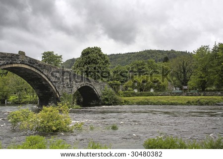 Llanrwst and the old bridge and court house now a tea room covered in ivy