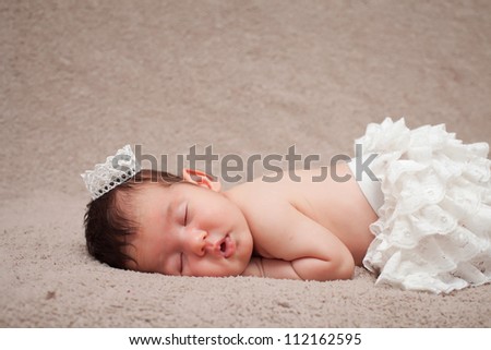 Newborn baby. Sleeping small princess.Shallow DoF.