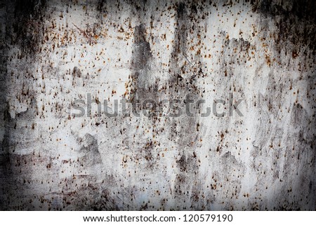 shabby old white paint on a rusty metal in the background