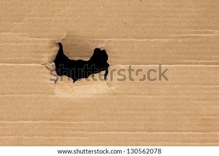 black hole in a cardboard background