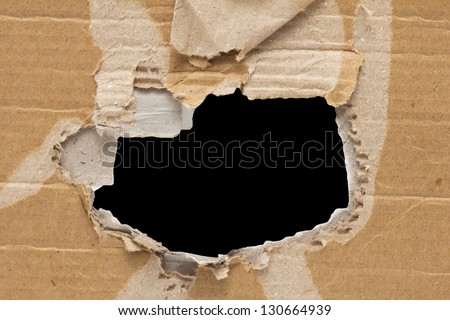 black hole in a cardboard background