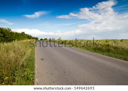 old asphalt road on nature