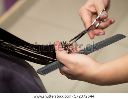 Women\'s haircut scissors at salon