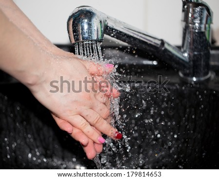 hand washing with tap water
