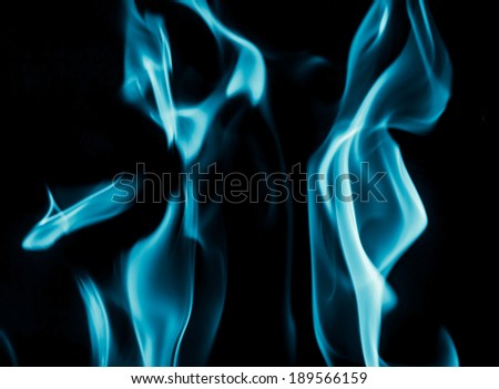 abstract background of blue flame fire on black background