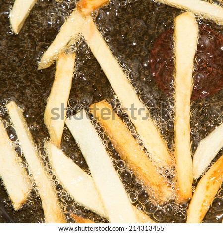 French fries are fried in a pan