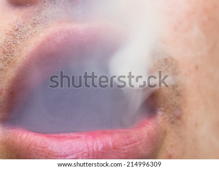 cigarette smoke in the mouth