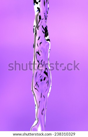 jet of water on purple background