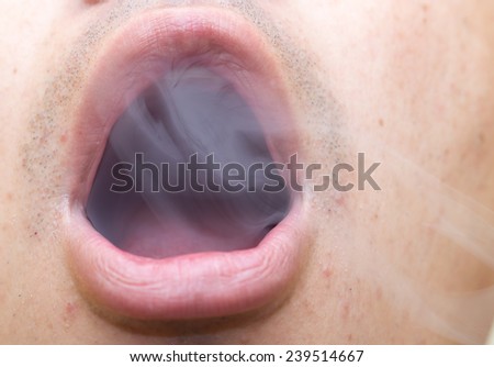 cigarette smoke in the mouth