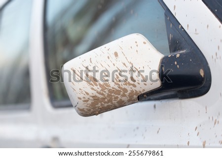 dirt on the white car