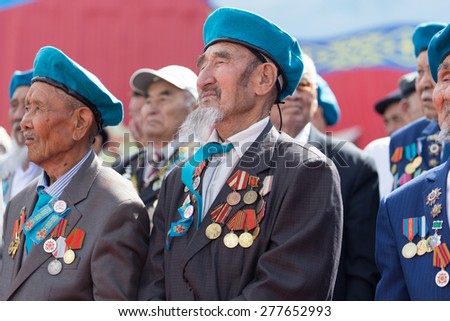 SHYMKENT city, KAZAKHSTAN MAY 9, 2015: Veterans of War. Victory Day. The memory of soldiers of the Great Patriotic War. Victory Day celebration in the city of Shymkent, Kazakhstan May 9, 2015