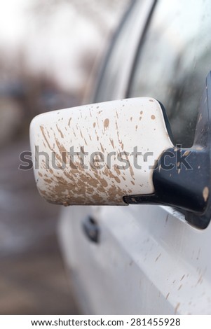dirt on the white car