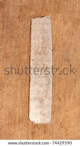splinter asbestos pipe on fa background of the rough sackcloth