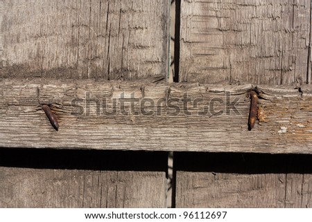rusty nails in wood