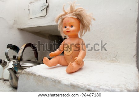 old doll in the oven