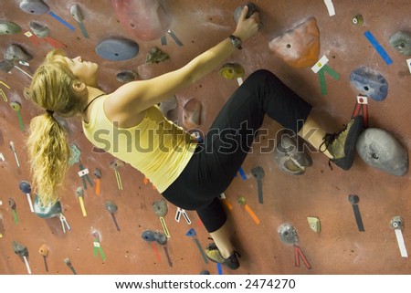 on an indoor rock-climbing