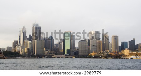 Buildings in Sydney, Australia business district skyline taken from Sydney Harbor