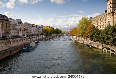 Seine River in the autumn and buildings along the banks of the river in Paris, France