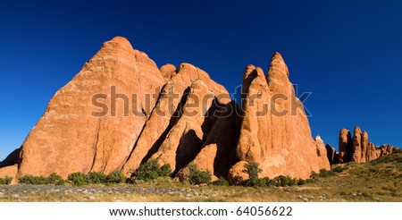 Giant orange colored sandstone rock fins of Arches National Park in the southern Utah desert