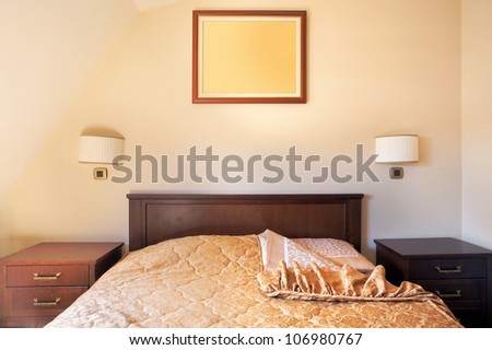 Interior of a room for two in a hotel, apartment\'s bedroom.