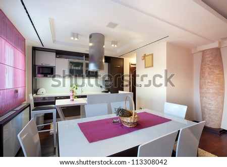 Interior Of A Modern Home, View On Dining Room And Kitchen.