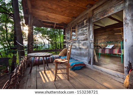 Wooden house in forest, house made of natural materials.