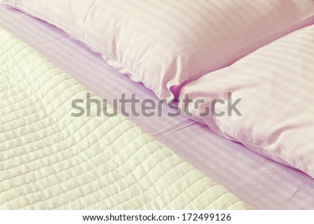 Details and textures of a modern bed sheets.