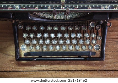 Retro design of an old typewriter, dusty surfaces in good shape.