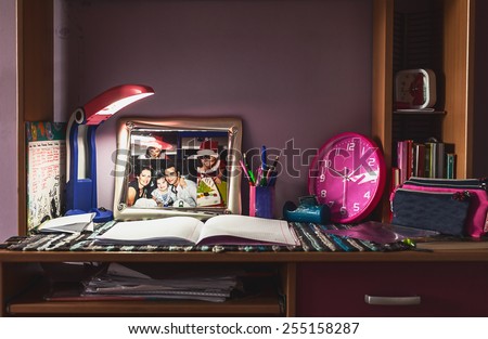 Table of a child, place in kid\'s room for doing school homework and learning.