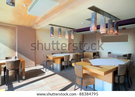 Furniture and decoration of a restaurant, modern style, day time.