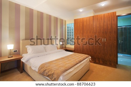 Interior of a hotel room for two, one part of a large apartment.