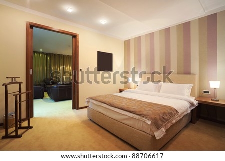 Interior of a hotel room for two, one part of a large apartment.