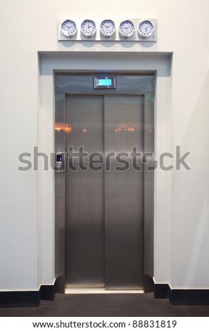 Closed metal elevator door details, modern design, interior of a hotel.