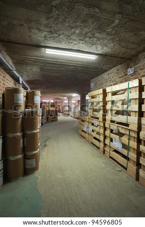 Interior of a warehouse in a printing factory, raw materials in stock.