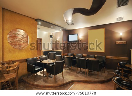 Modern and simple cafe interior with wooden classical furniture.