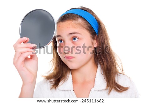 stock-photo-teen-girl-examine-her-pimples-in-the-mirror-245111662.jpg