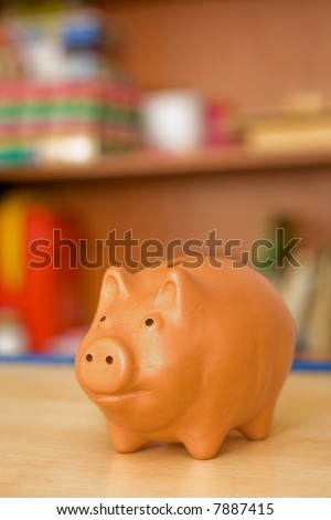 Clay piggy bank in the children\'s room
