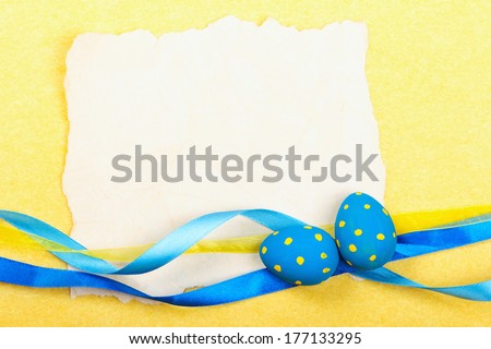 Easter card. Old paper with decorations on yellow background. Stock photo