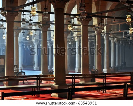 The interior of the oldest Muslim mosque in Africa. Rays of light penetrate inside the mosque. Egypt. Africa. Cairo.