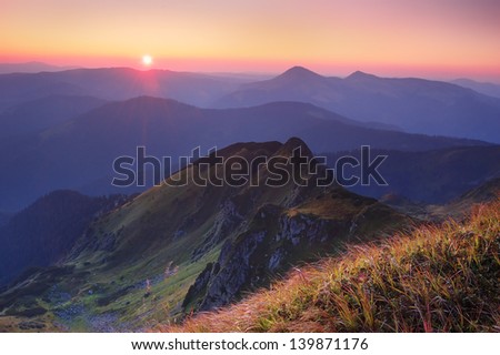 Mountain landscape in the morning with the rising sun