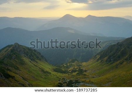 Dawn in the mountains. Morning landscape in gentle tones. Carpathian mountains, Ukraine