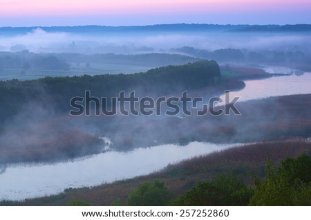 Morning mist over the river. View from the hill. River Ros, Ukraine, Europe